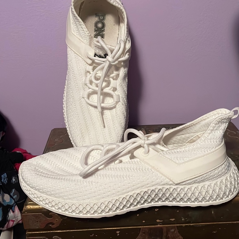 Ladies white designer pony sneakers, high top. Very comfortable.